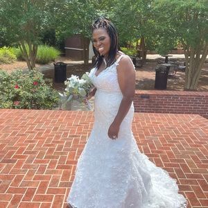 Selling  my wedding dress. I purchased in May size 14 and dry clean. Ask $275